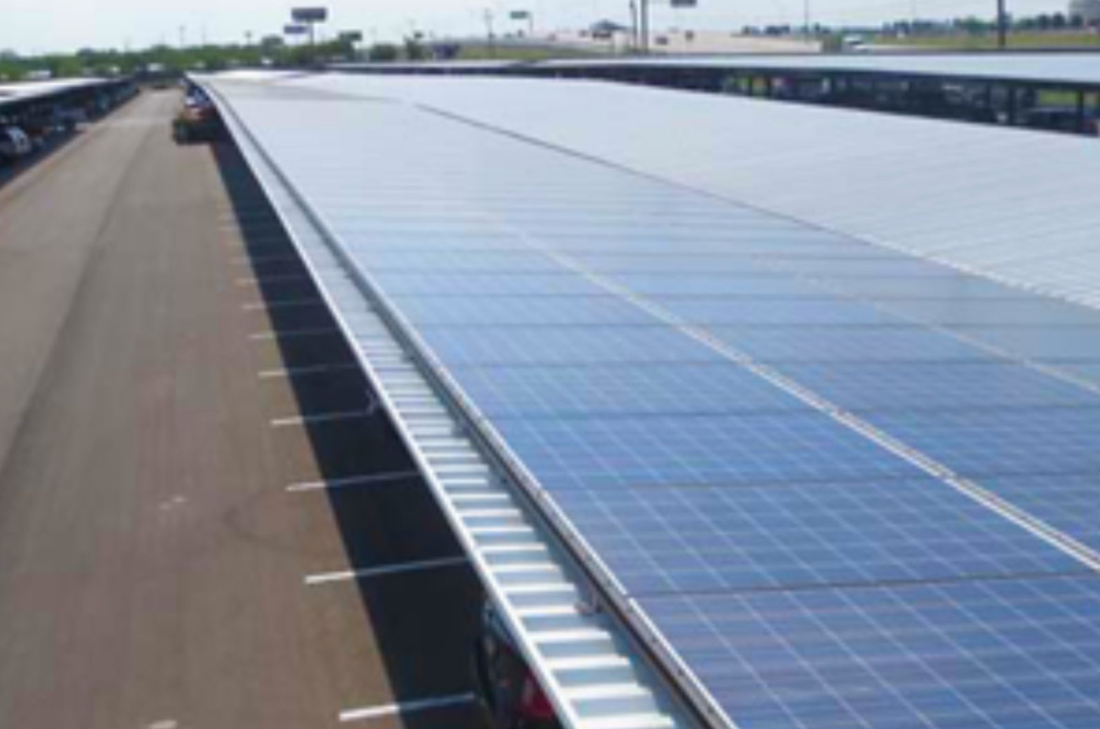 Solar panels on a parking lot roof.